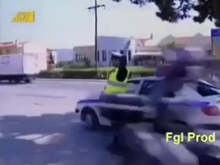 the policeman stopped the motorcyclist